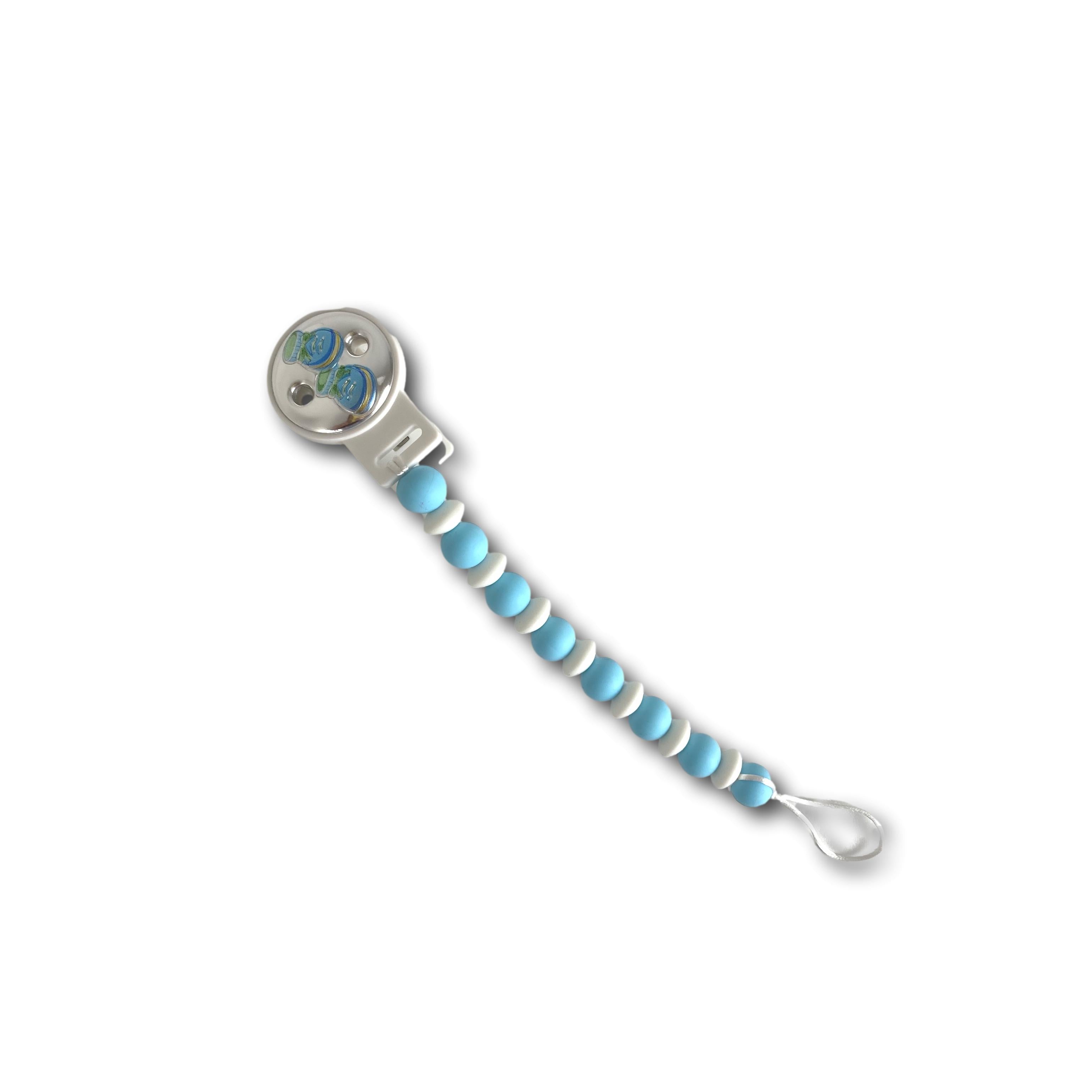 Spilla porta ciuccio azzurro con scarpette in argento bilaminato