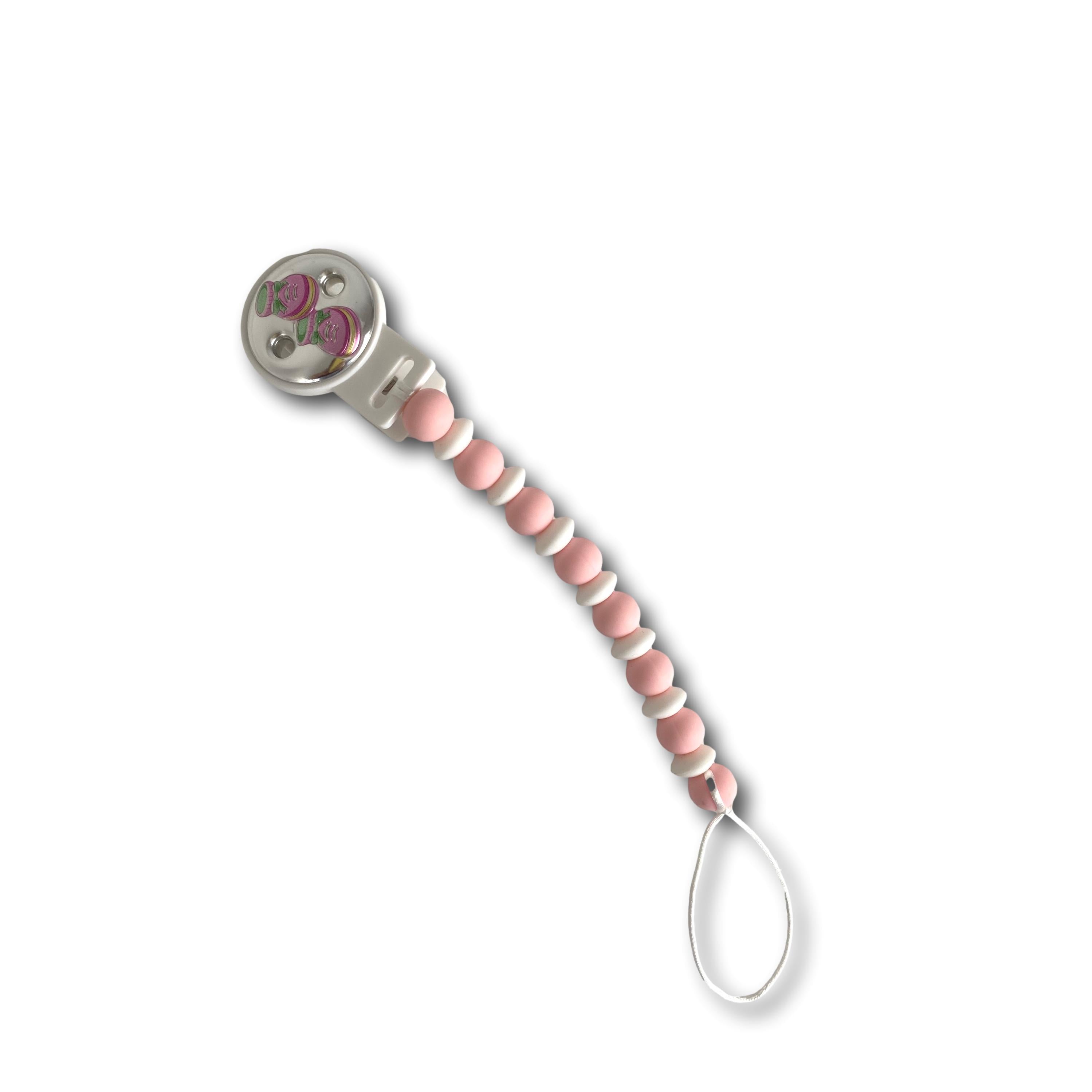 Spilla porta ciuccio rosa con scarpette in argento bilaminato