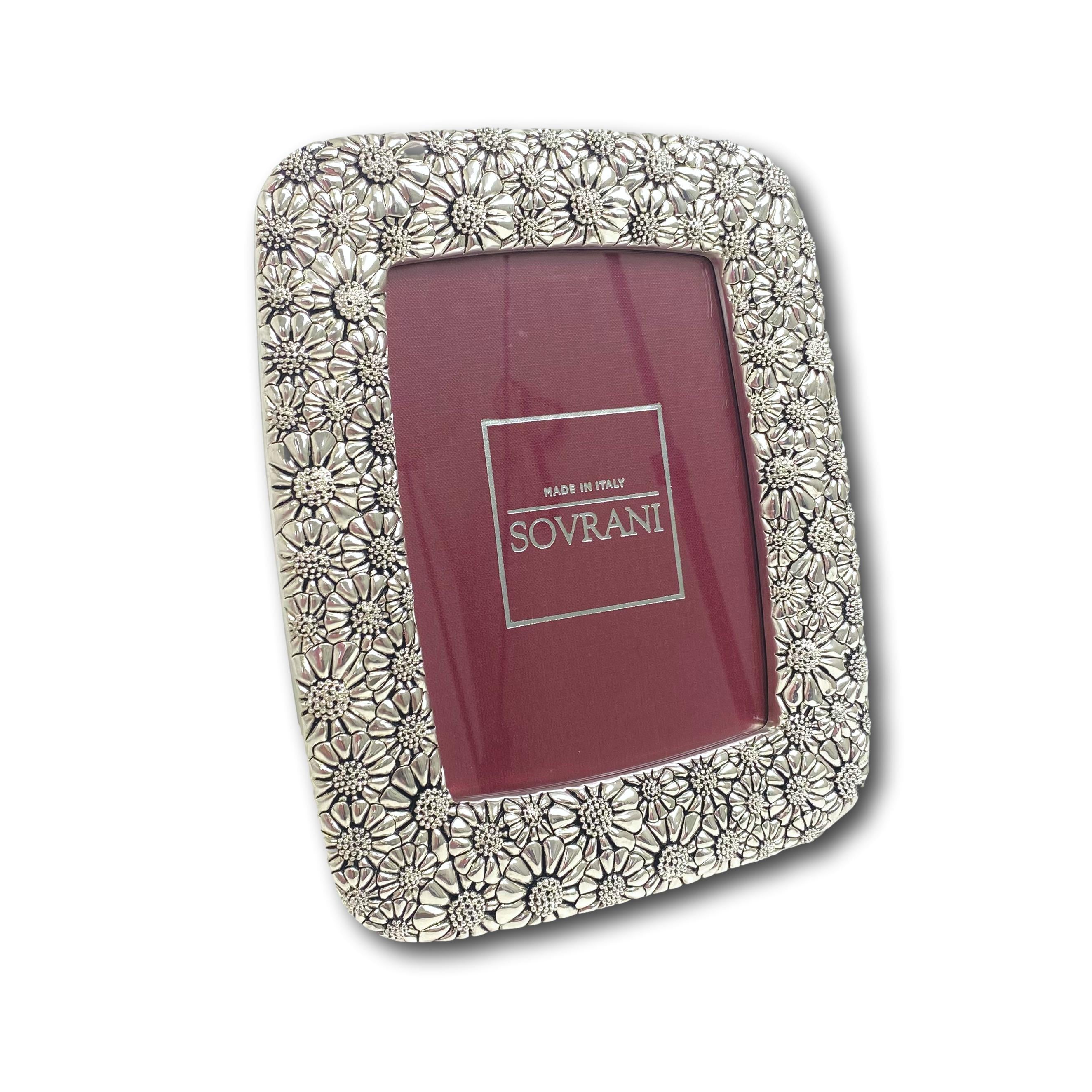 Cornice con margherite in argento